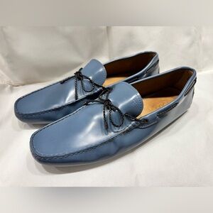 Tod's Gommino driving shoes in blue w/ handmade stitching, monogram, woven tie